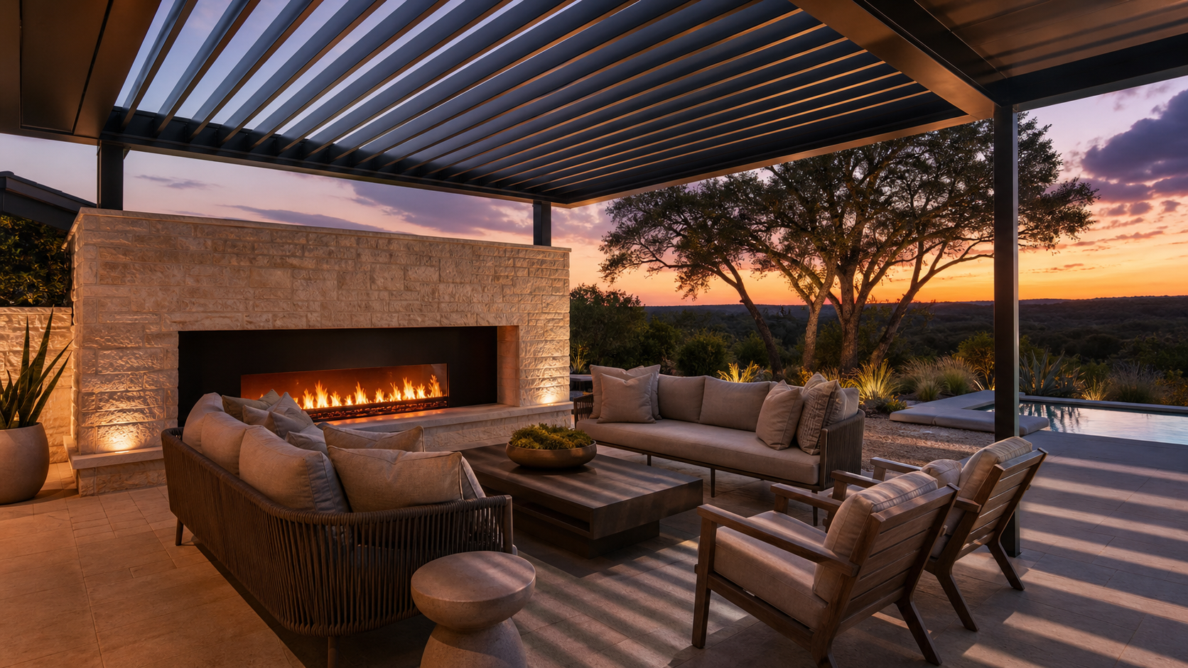 Bioclimatic pergola with louvered roof over a luxury outdoor living room at dusk