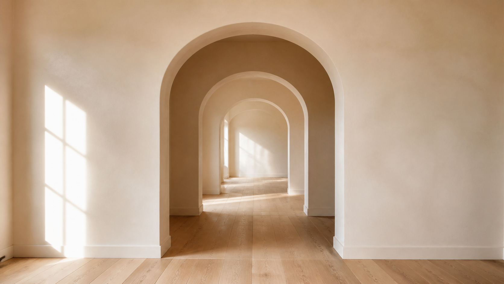 Enfilade of plaster arched openings in a hallway