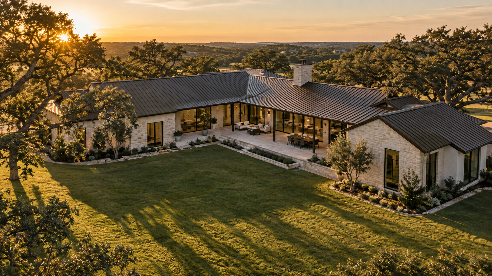 Single-story modern home with a long low roof spread across a wide wooded lot