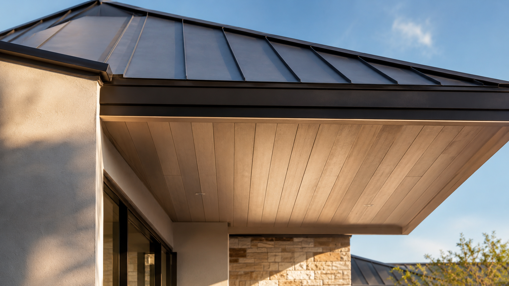 Deep roof overhang and wood soffit detail on a custom home