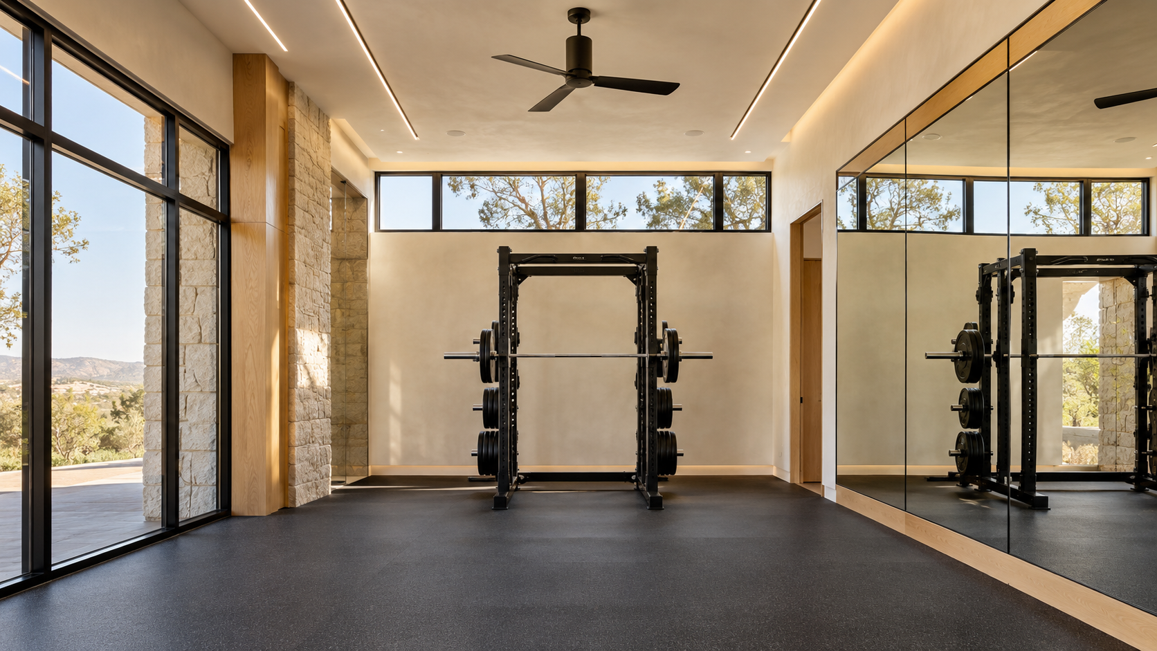 Tall-ceiling home gym with clerestory windows, flush lighting, and a squat rack