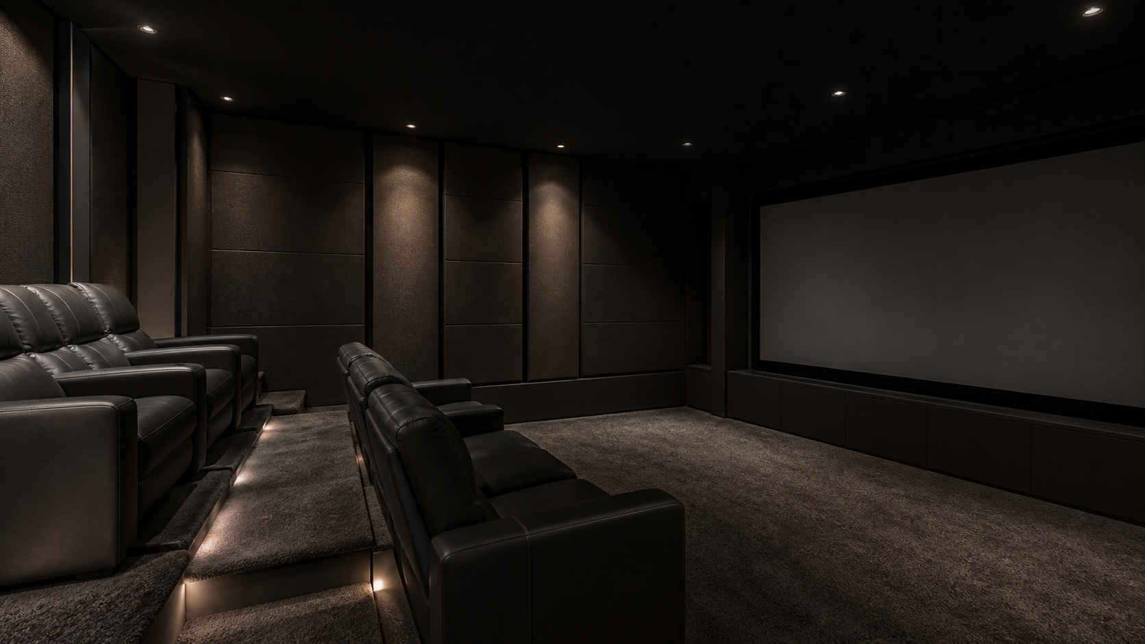 Dedicated home theater with tiered seating and fabric-wrapped acoustic panels