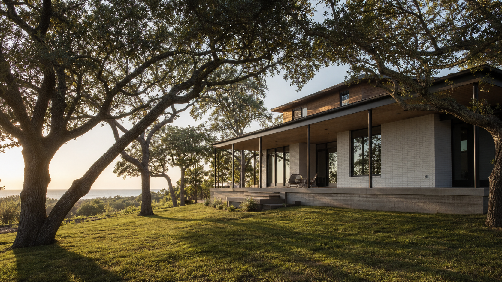 Contemporary Texas Gulf Coast home on a raised finished floor beneath live oaks